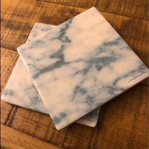 Two blue marble coasters